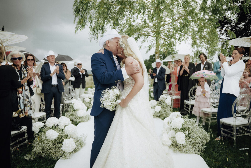 Bridal couple walking down the aisle after ceremony