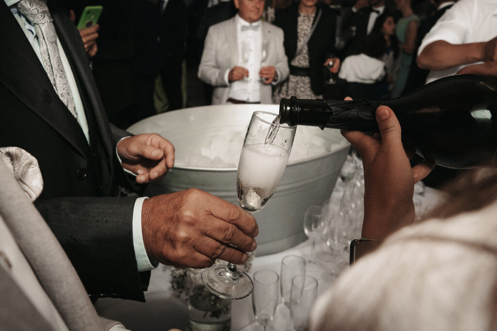 Refilling glasses during champagne Reception