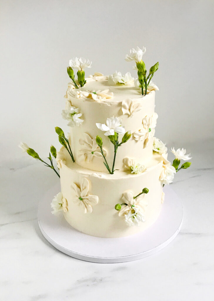 Wedding Cake by Lisa Weinberg with flowers